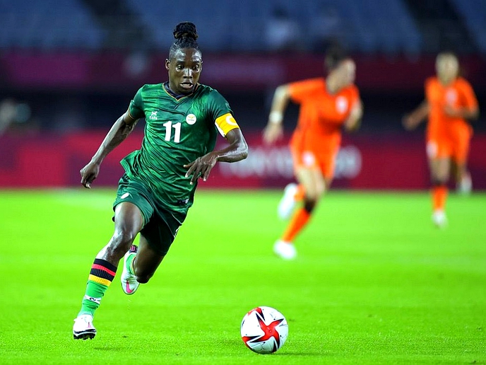 Wang scores four to deny Zambia in eight-goal thriller