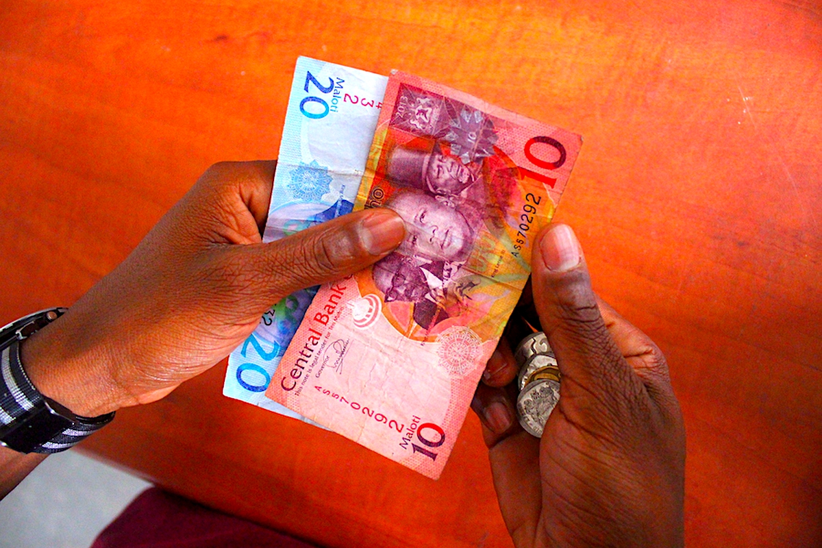 Does advertising pay? Money transfers for the unbanked people of Lesotho